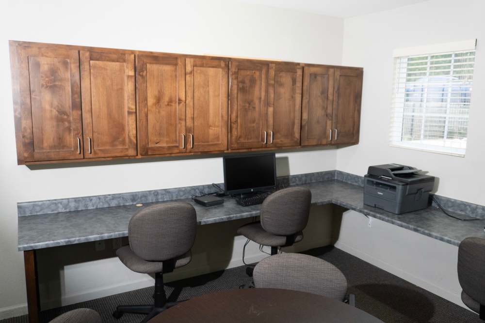 Printer and monitors in the business center at Hardin Terrace in Jefferson, Georgia