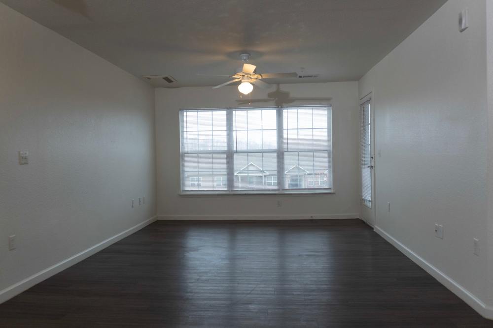 Living room with large windows at Hardin Terrace in Jefferson, Georgia
