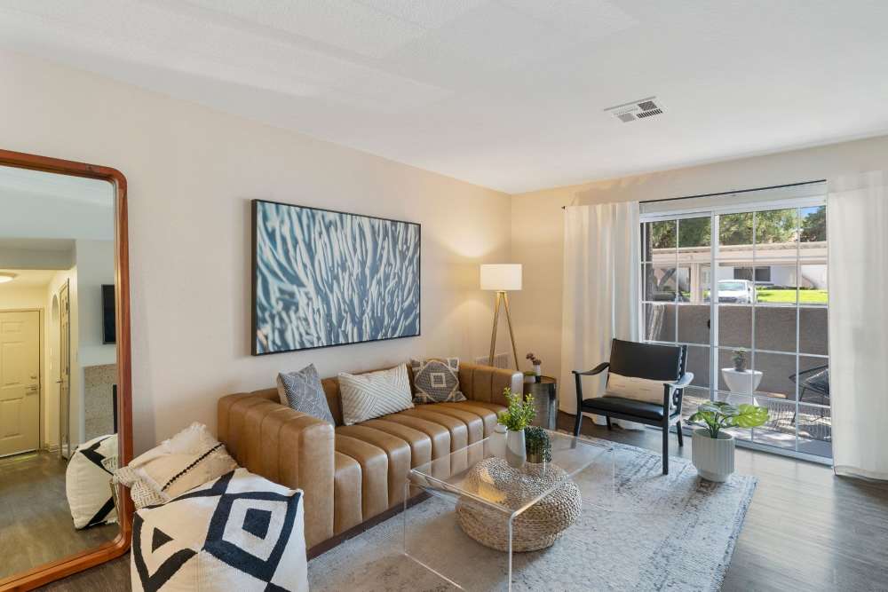 Living room with large window at Fairways on Green Valley in Henderson, Nevada