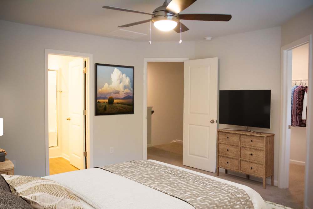 Bedroom with ceiling fan at Hart Townes in Woodruff, 