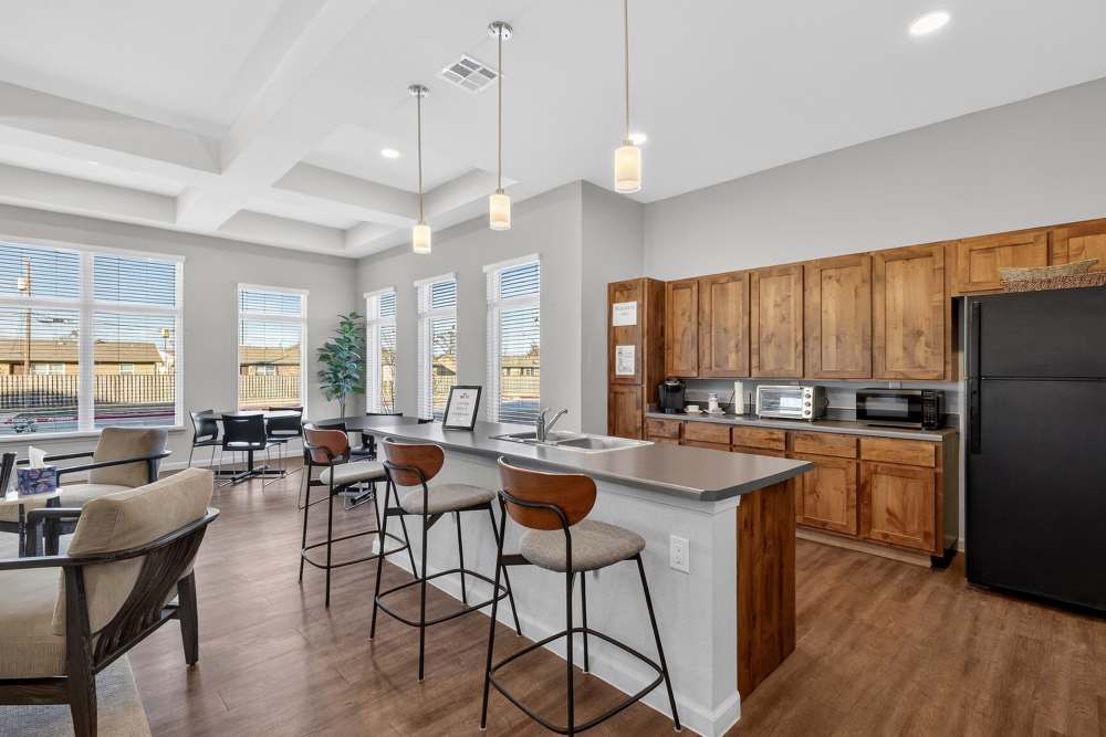 Community kitchen with lounge  at Juniper Pointe in Kaufman, Texas
