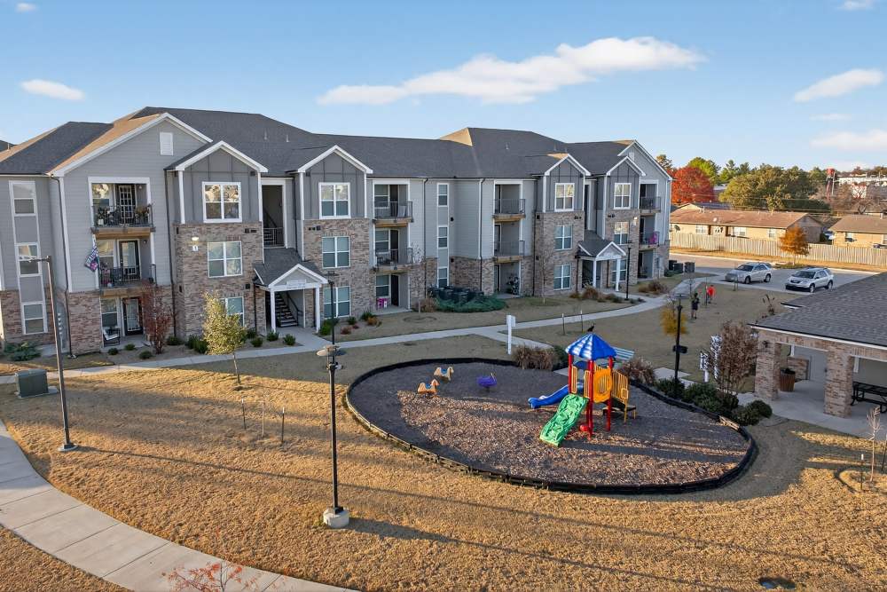 Kids play area with slides at Juniper Pointe in Kaufman, Texas
