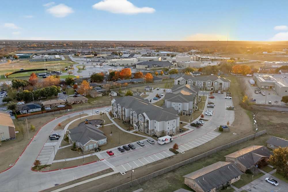 Community ariel view with car parking four at Juniper Pointe in Kaufman, Texas