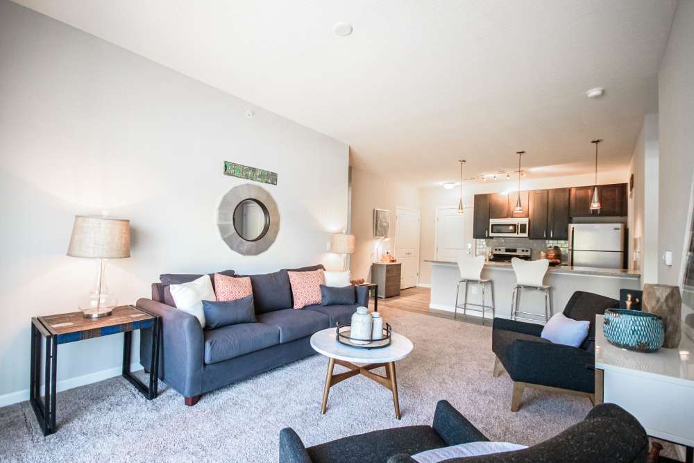 Naturally well-lit living room at Mirada Apartments in Lewis Center, Ohio