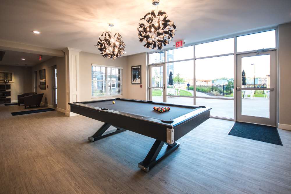 Resident lounge with billiards table at Mirada Apartments in Lewis Center, Ohio