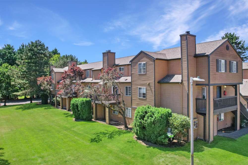 Community buildings surrounded by greenery at Renaissance at 29th Apartments in Vancouver, Washington