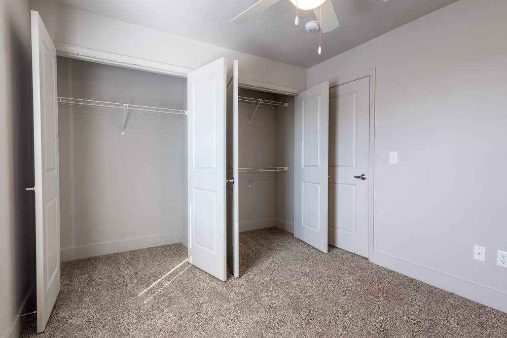 Bedroom with walk-in closet at North Grand Villas in Amarillo,Texas