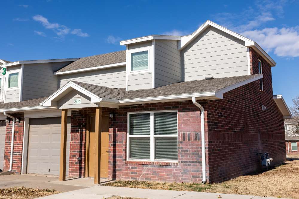Building exterior with brick like architecture at North Grand Villas in Amarillo,Texas