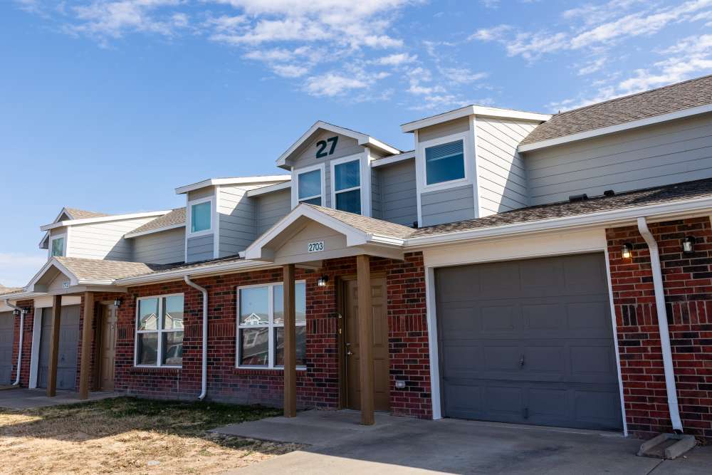 Property exterior with parking garage at North Grand Villas in Amarillo,Texas