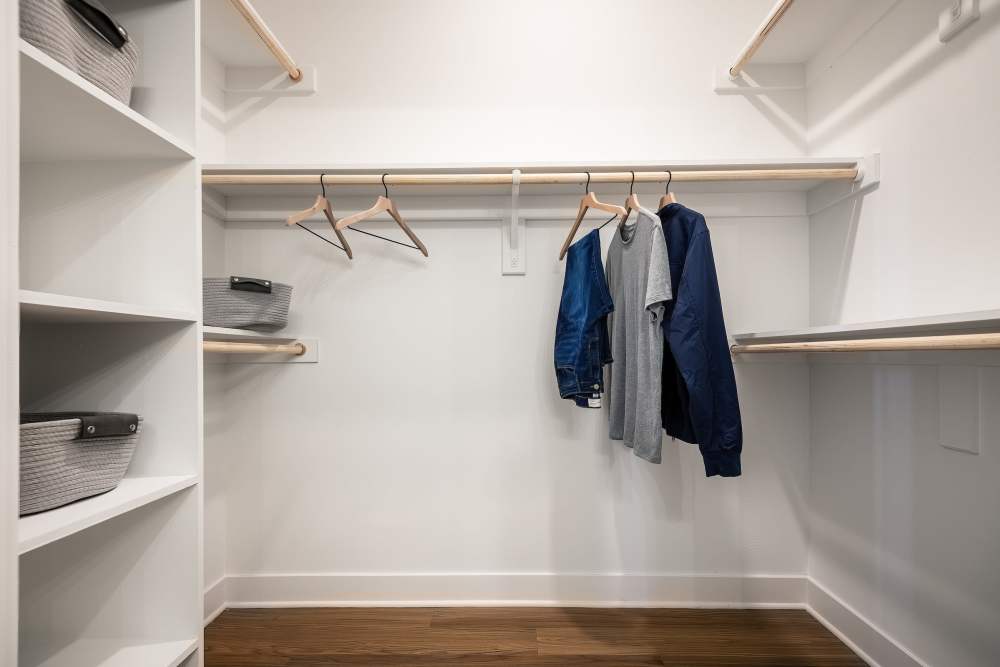 walk in closet with built in shelves