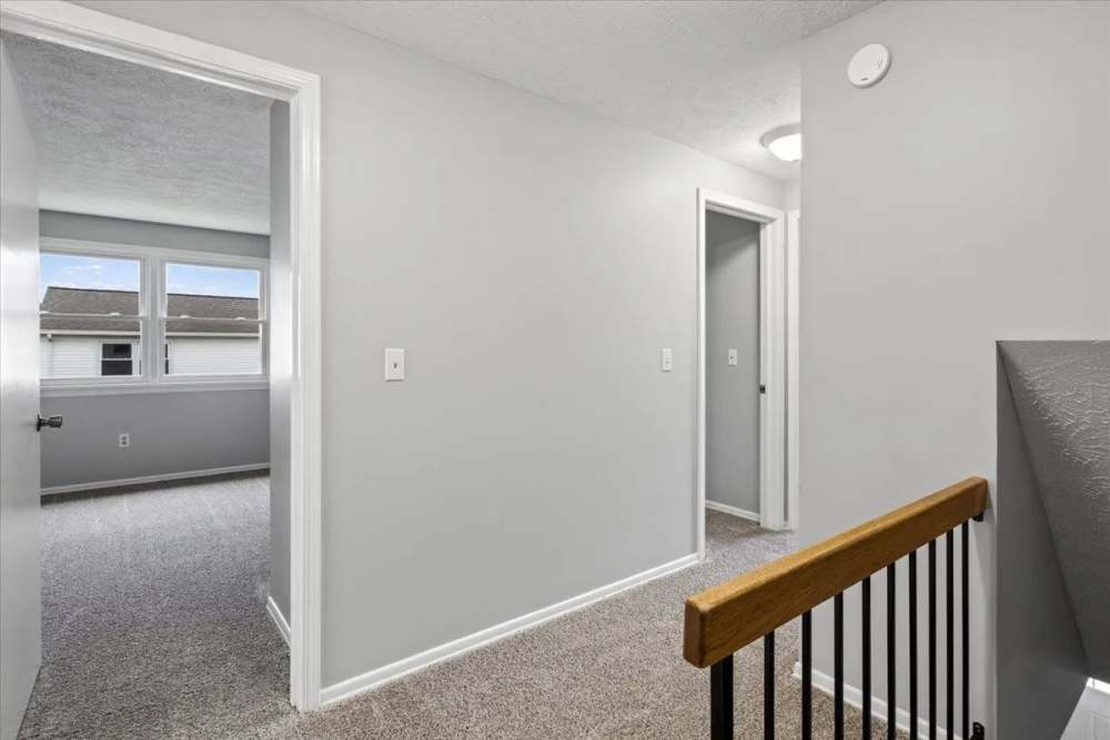 Apartment with stairwell access at Summit Knolls Apartments & Townhomes in Webster,New York
