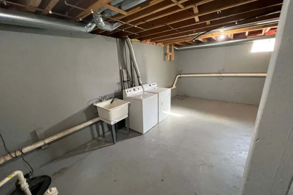 Laundry room at Summit Knolls Apartments & Townhomes in Webster,New York