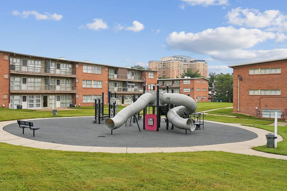 Play area with a slide at Belcrest Plaza in Hyattsville, Maryland