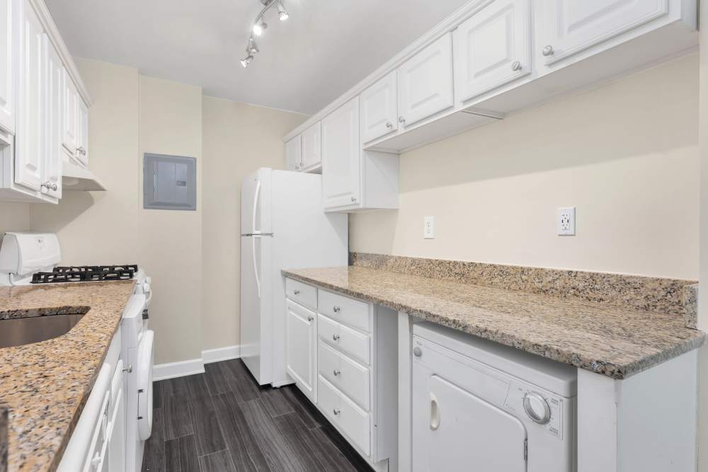 Kitchen with granite countertops at Courts Of Madison in Silver Spring, Maryland