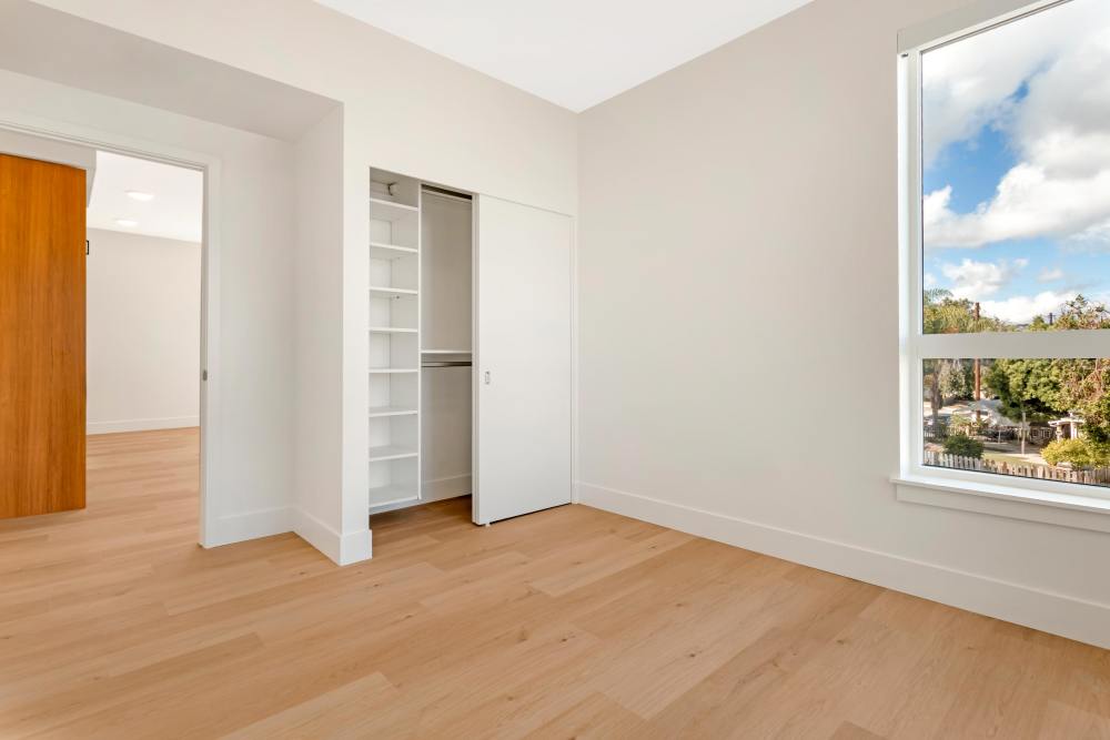 Bedroom and Closet at the Millton Apartments in Redwood City