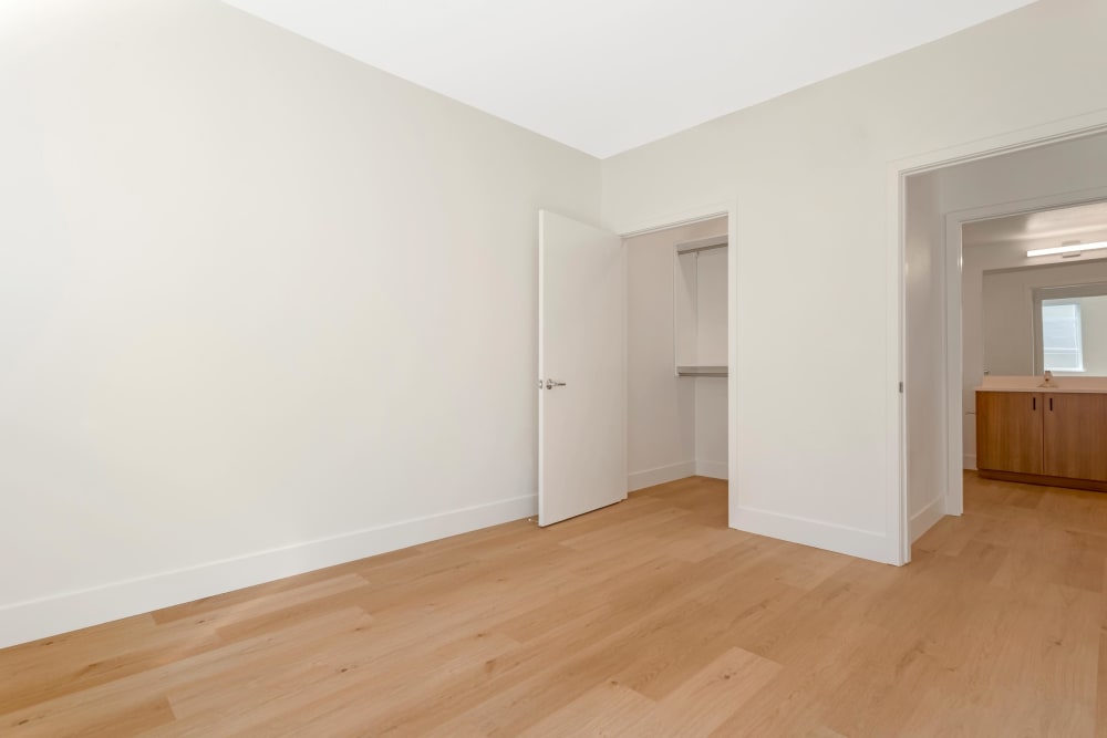Bedroom and Bath Vanity at the Millton Apartments in Redwood City