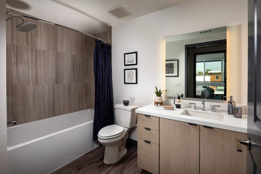 Bathroom with bath tube at Haven Apartments in Los Angeles, California