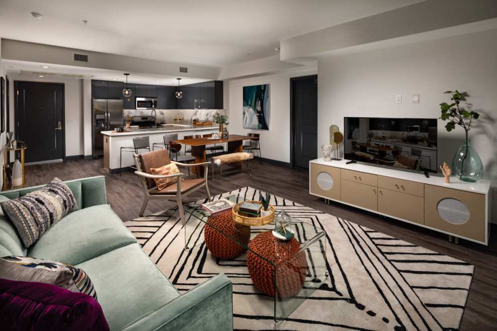 Living room with television at Haven Apartments in Los Angeles, California