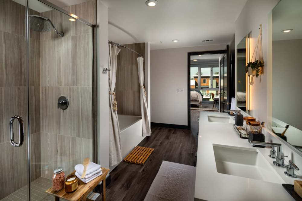Bathroom with walk -in shower at Haven Apartments in Los Angeles, California