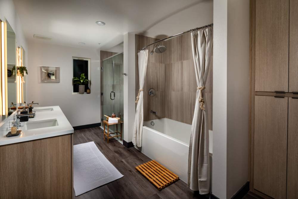 Bathroom with bath tube at Haven Apartments in Los Angeles, California 