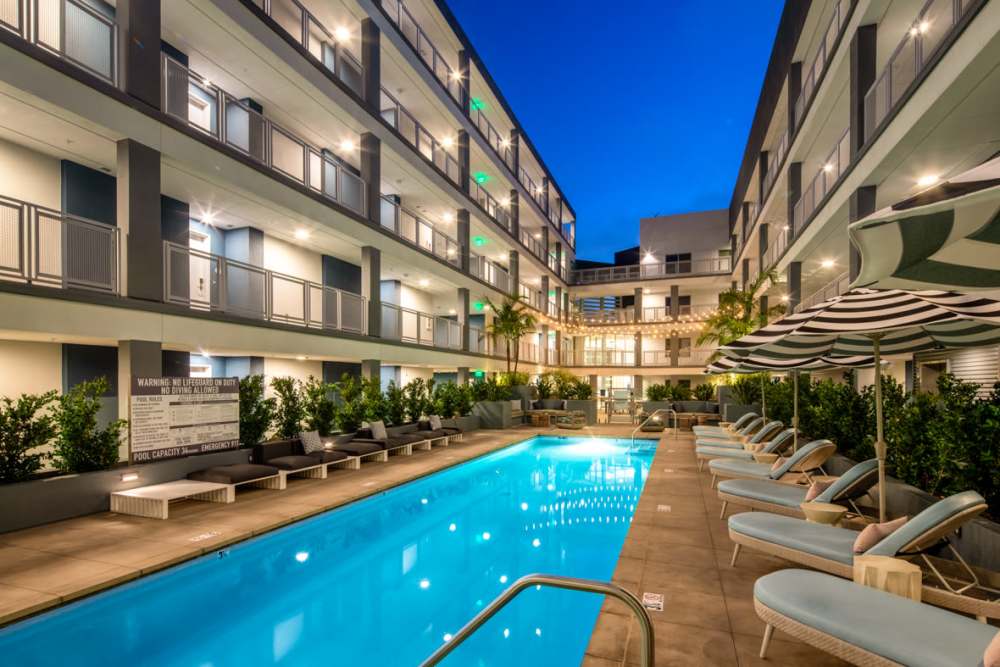 Pool with lounge chair  at Haven Apartments in Los Angeles, California