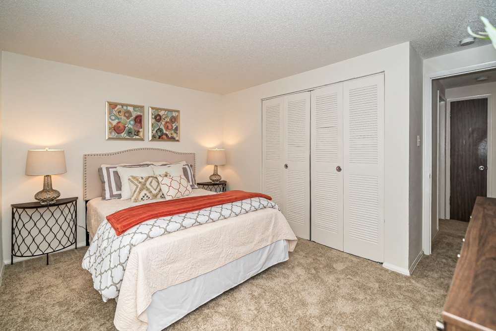 Spacious bedroom with carpet flooring at Waterford West in Manchester, Missouri