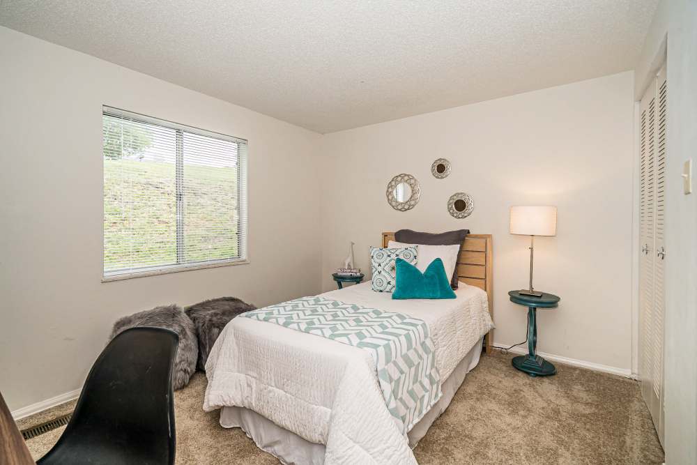 Bright bedroom with window at Waterford West in Manchester, Missouri