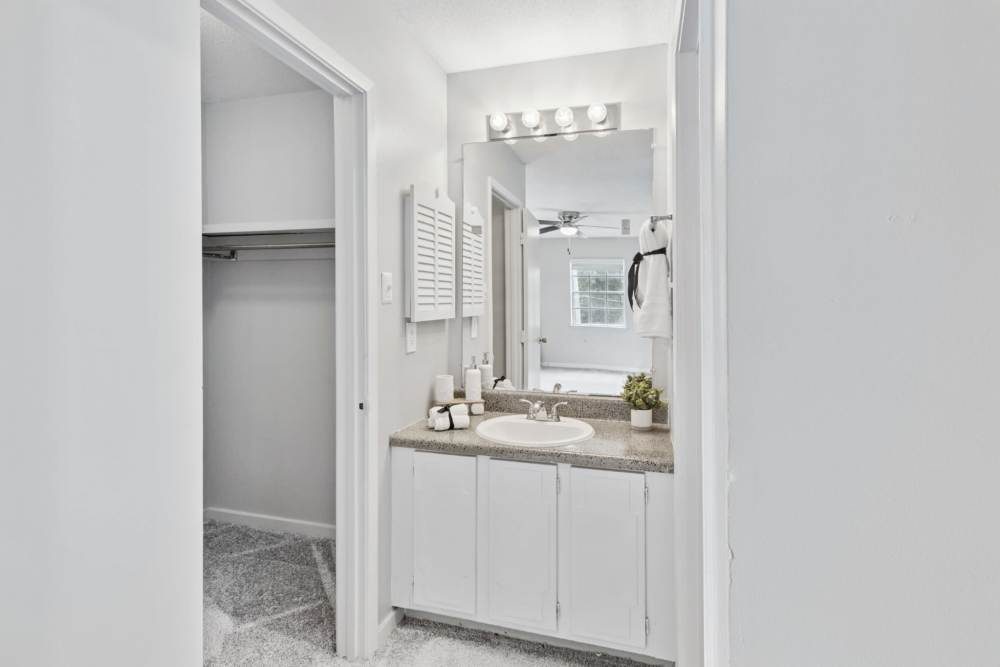 Bathroom with a mirror at River Oaks in Vicksburg, Mississippi