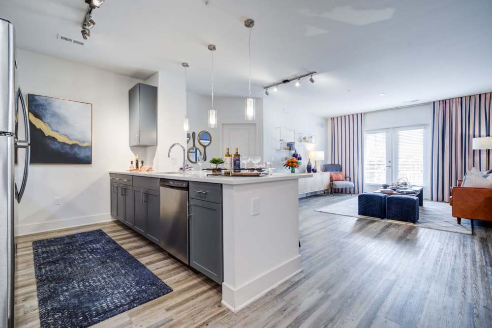 Kitchen with an island and a spacious living room at J Creekside at Exton in Exton, Pennsylvania