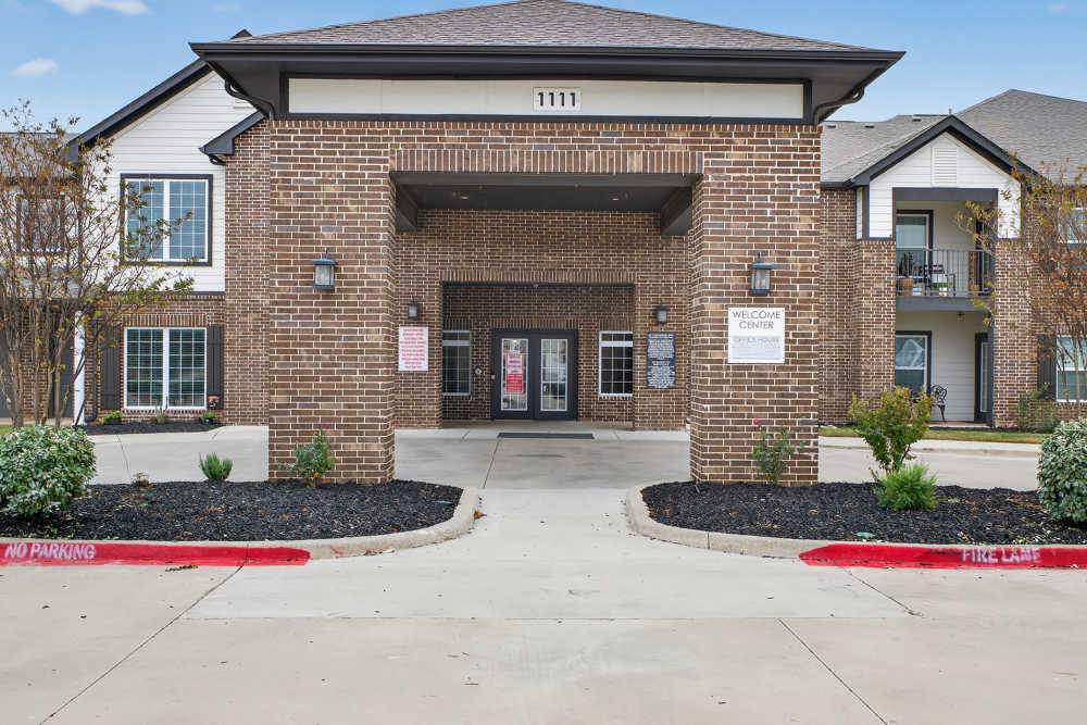 Exterior view of the property complex at Hill Court Villas in Granbury,Texas