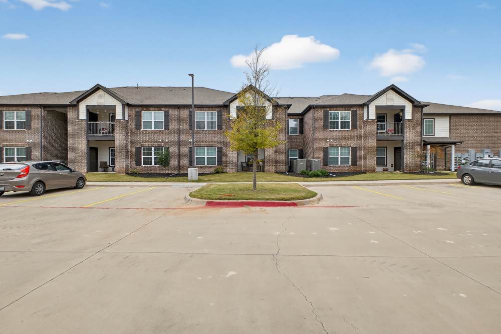 Exterior view of the property complex at Hill Court Villas in Granbury,Texas