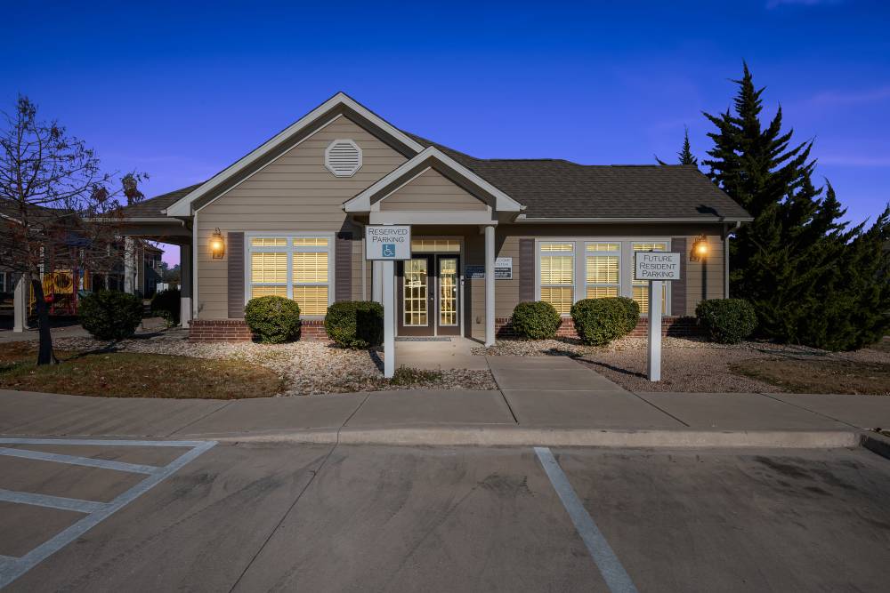 Charming residential building with inviting entrance and landscaped surroundings at Riverside Park in Early, Texas