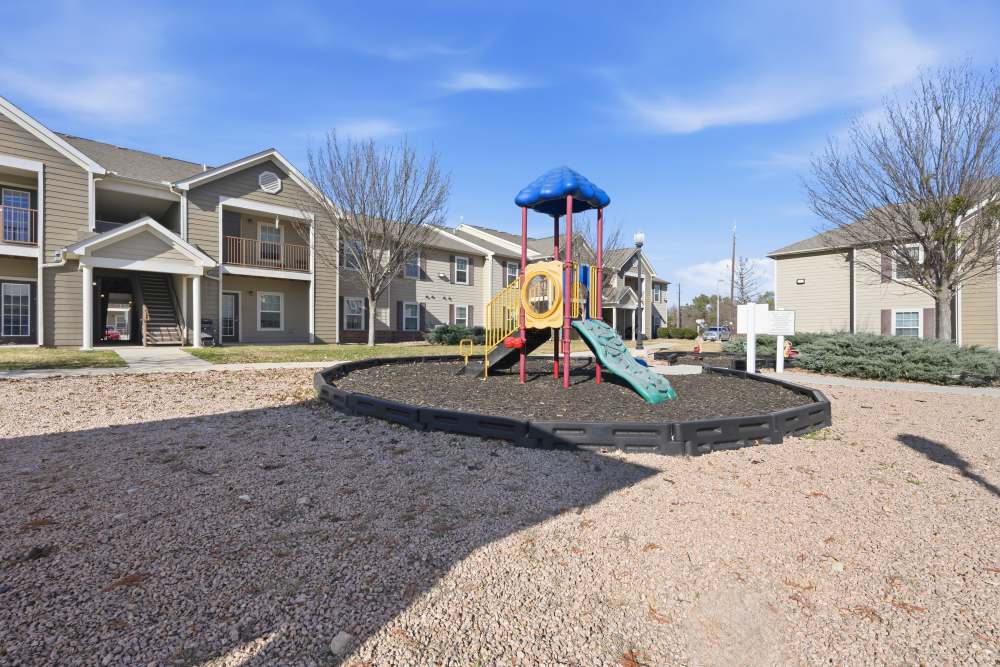 Colorful playground in a charming residential community setting at Riverside Park in Early, Texas