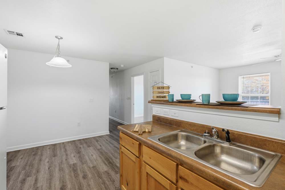Upgraded kitchen with modern fixtures and open layout at Riverside Park in Early, Texas