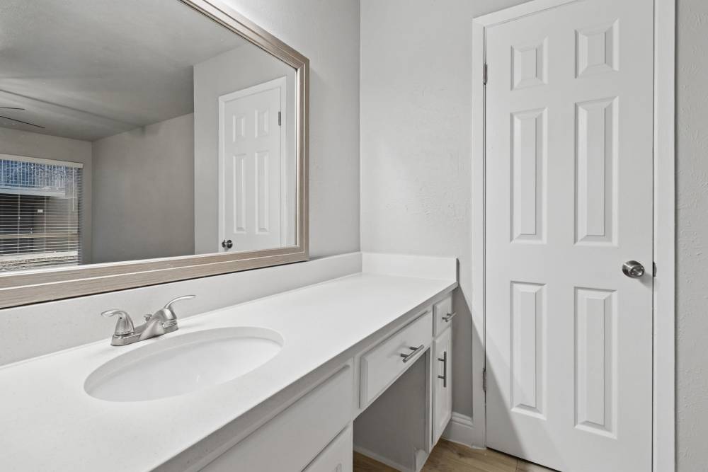 Modern bathroom with vanity at Avondale Parc at Bellmar in Dallas, Texas