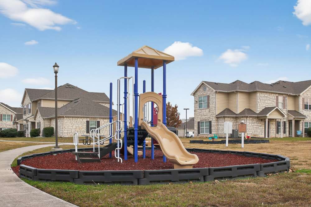 Playground with sliders at Riverstone Trails in Sunnyvale, Texas