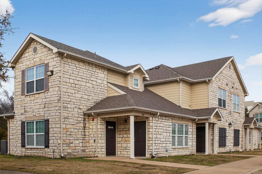 Community building exterior view at Riverstone Trails in Sunnyvale, Texas 