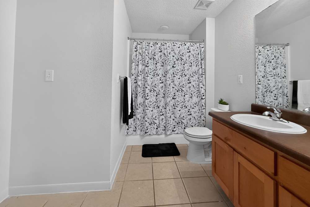 Bathroom with bathtub at Riverstone Trails in Sunnyvale, Texas 