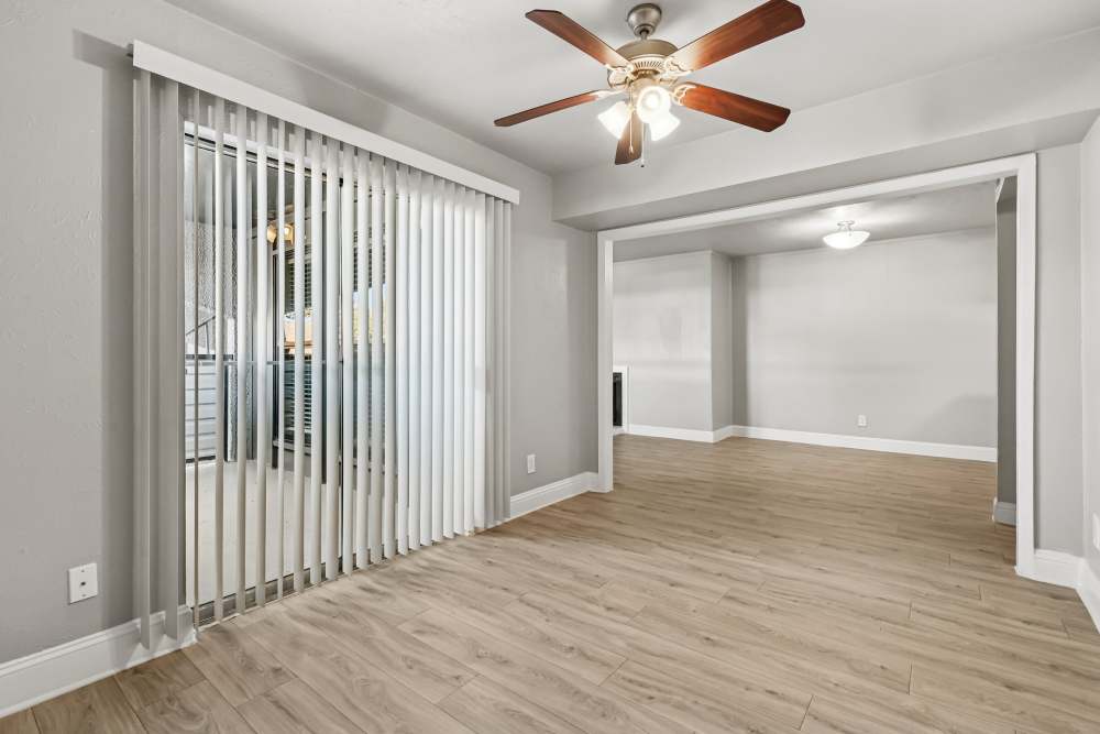 Unfurnished living room with ceiling fan at Aberdeen at Bellmar in Dallas, Texas