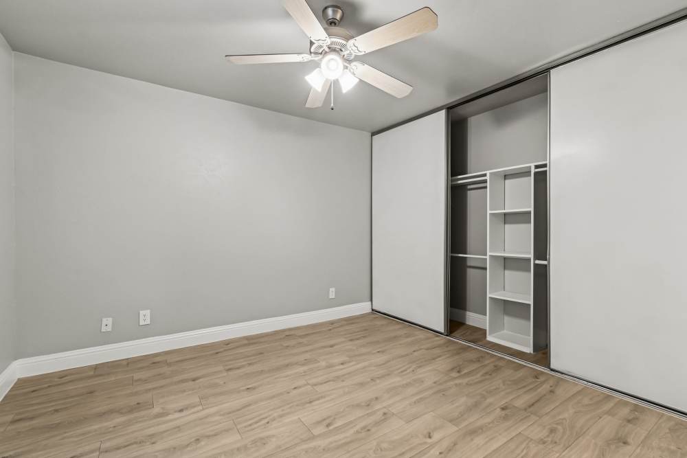 Unfurnished bedroom with large closet at Aberdeen at Bellmar in Dallas, Texas
