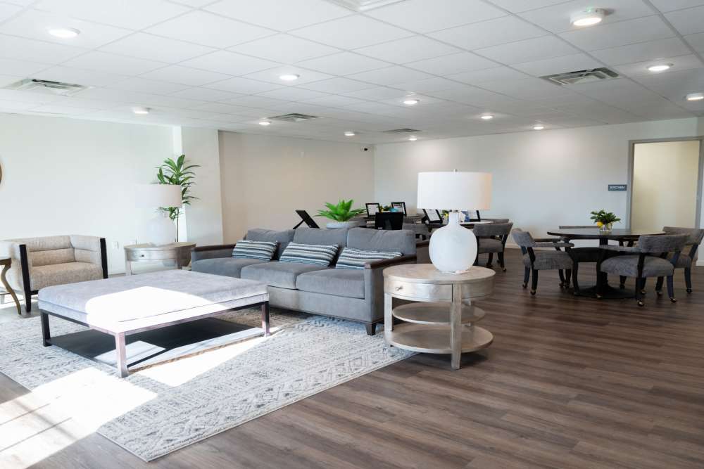 Spacious clubhouse with modern furnishings and abundant natural light at Savannah Terrace in Mustang, Oklahoma