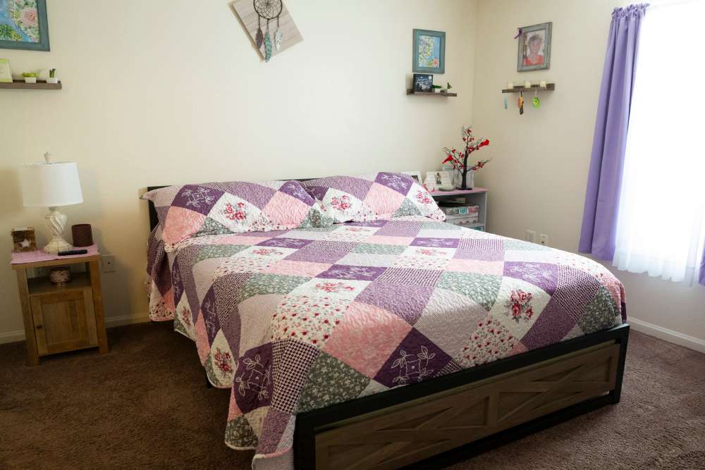 Well-designed bedroom at Stonebridge in Jacksonville, Illinois