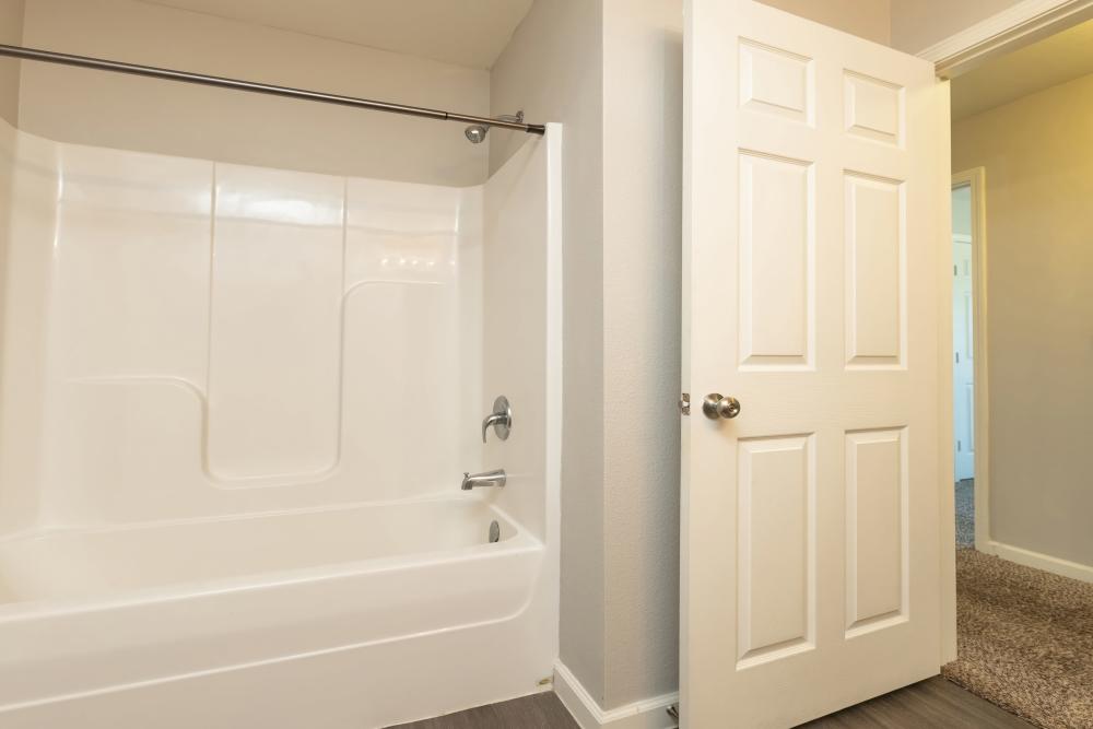 Walk-in shower in bathroom at Sunnydale Pointe in Wichita, Kansas