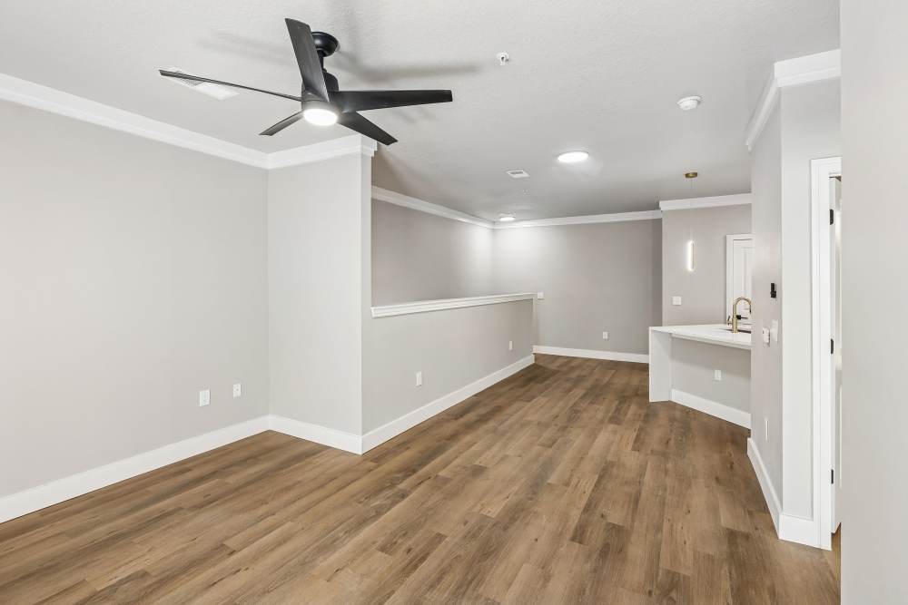 Charming bedroom with elegant decor and modern amenities at The Walton in Sanford, Florida.