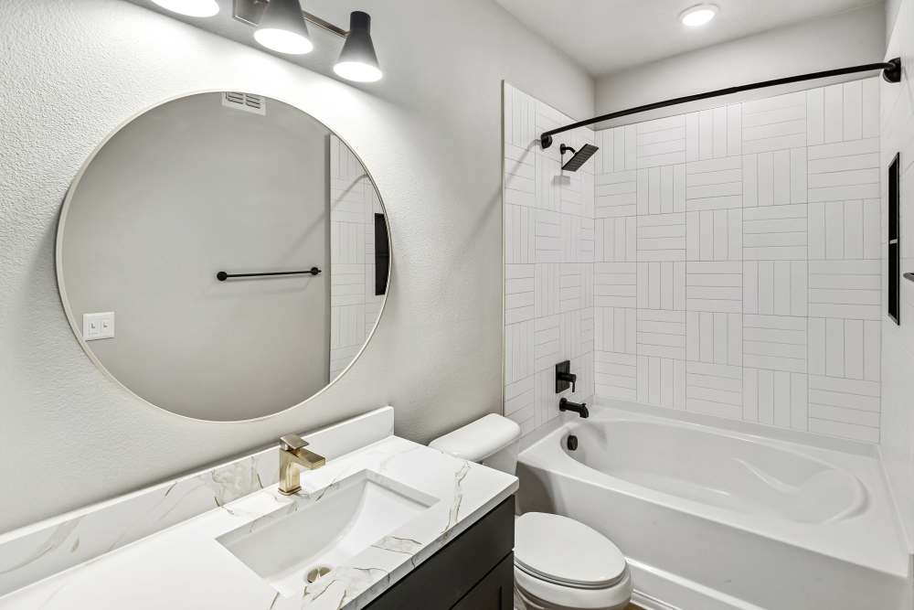 Modern bathroom with elegant fixtures and sleek design at The Walton in Sanford, Florida.