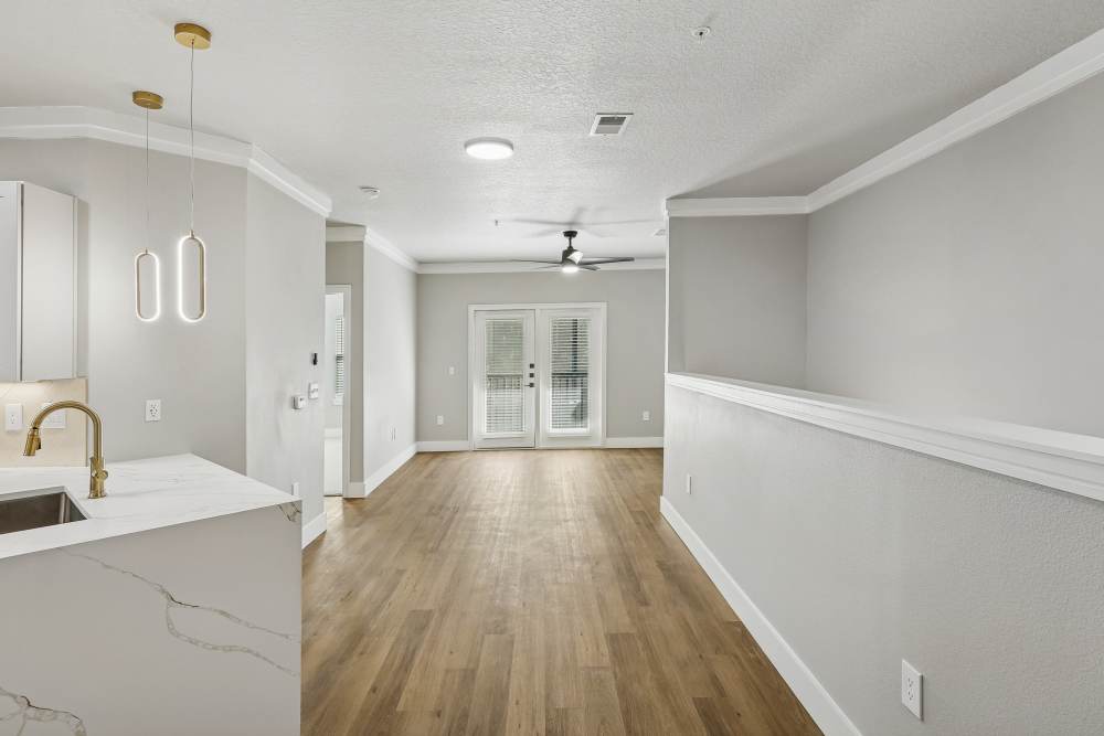 Inviting living area with a stylish blend of modern furnishings and cozy accents at The Walton in Sanford, Florida.