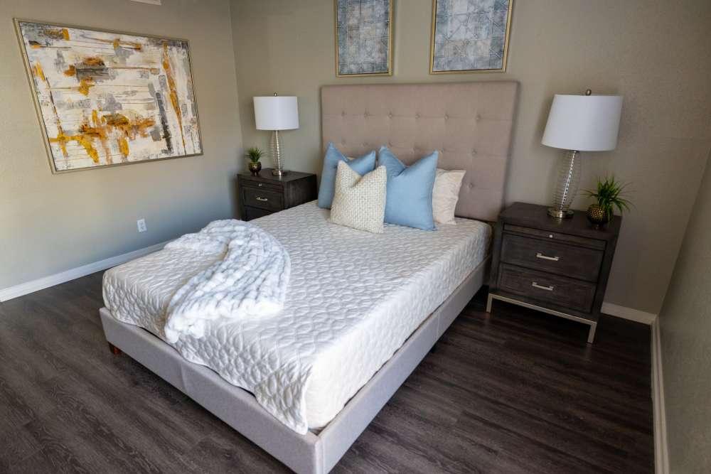 Bedroom with two side lamp at Rivercrest in Waco, Texas 