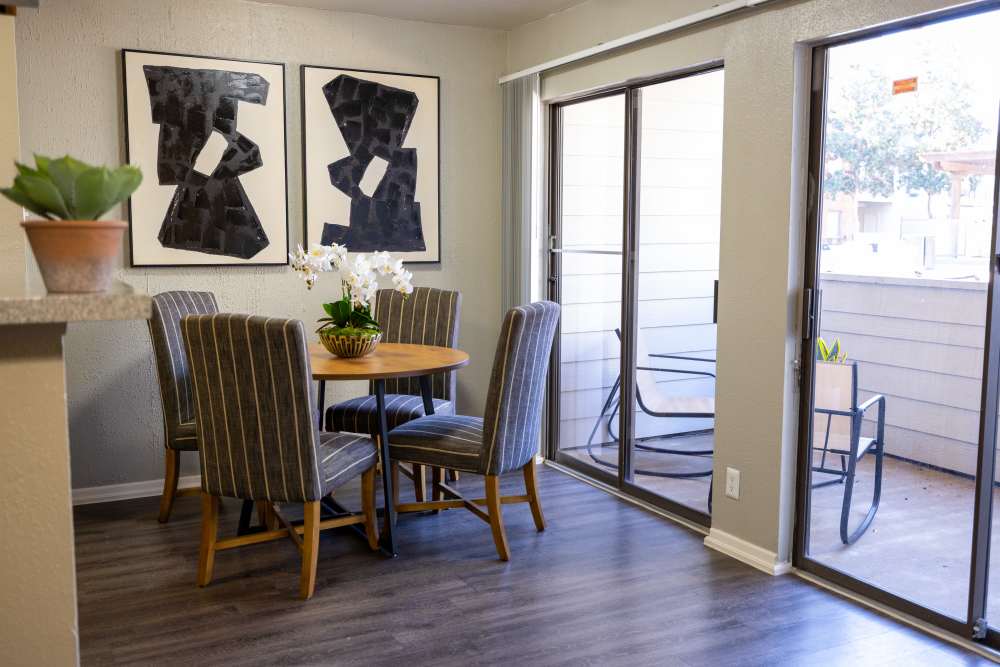 Dining area with attached patio at Rivercrest in Waco, Texas 