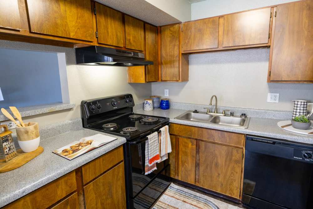 Kitchen with black color appliance  at Rivercrest in Waco, Texas 