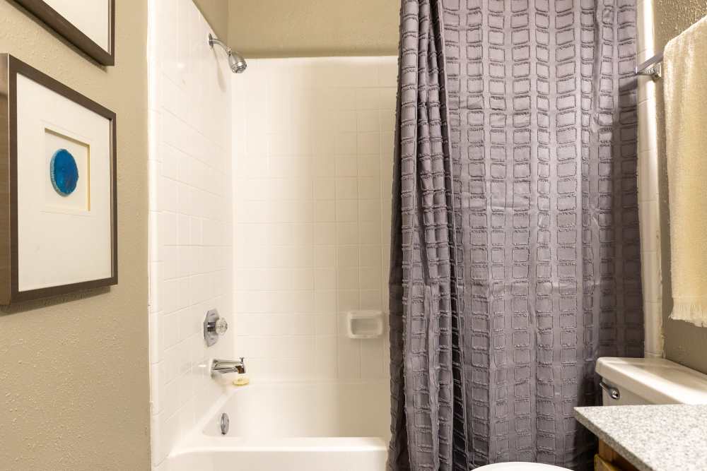 Bathroom with bathtub at Rivercrest in Waco, Texas 